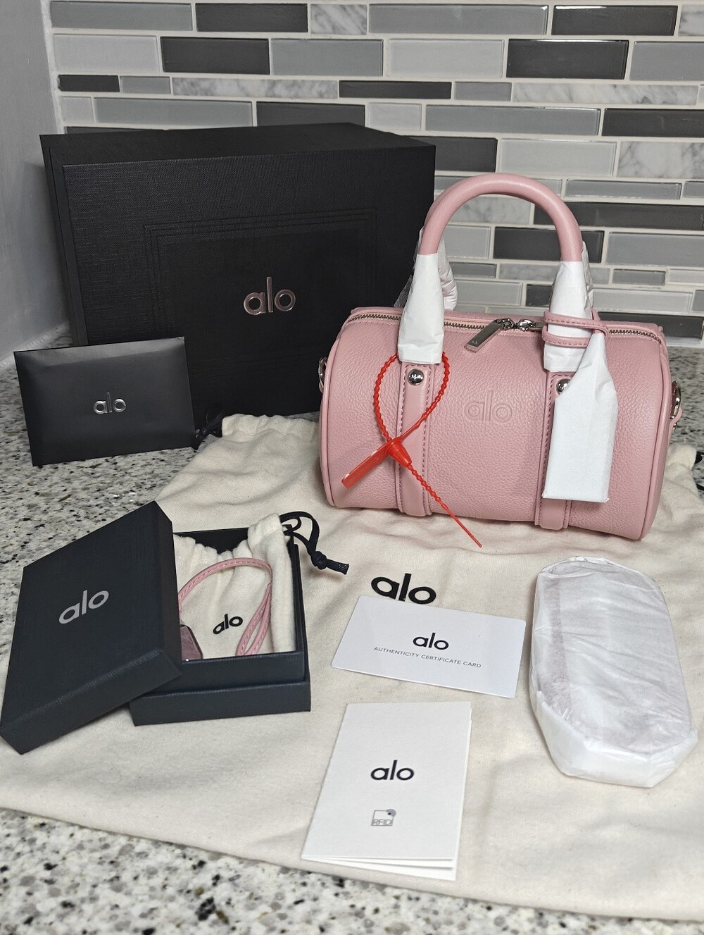 ALO Mini Voyage - Vintage Pink Leather